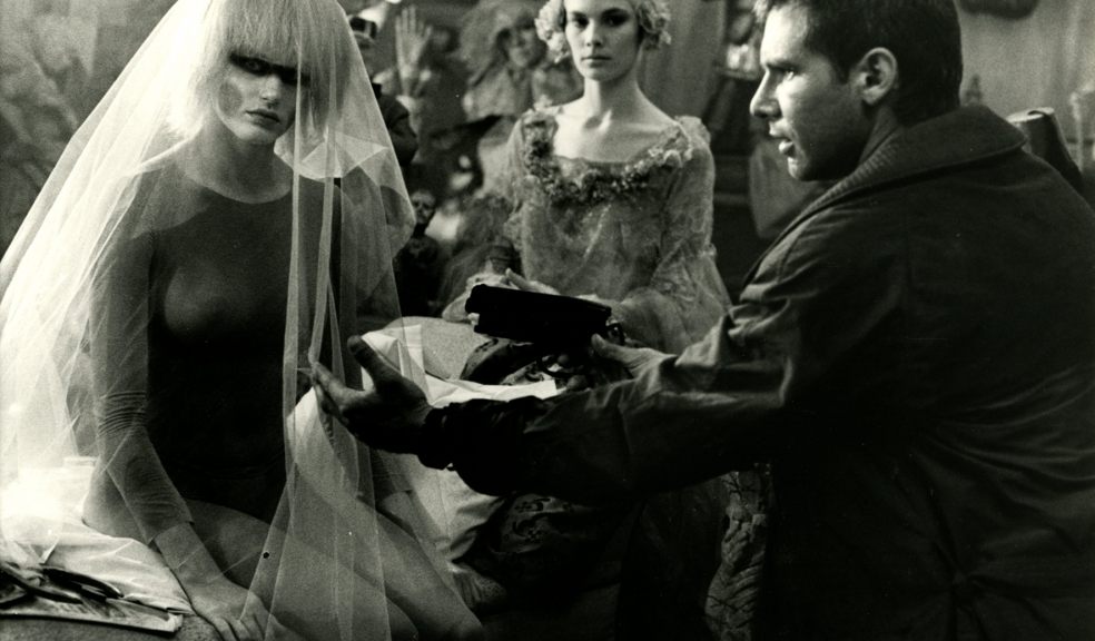 Deckard (Harrison Ford) tracks his quarry to a skyscraper apartment filled with life-size dolls in Blade Runner, a Ladd Company release through Warner Bros. Distributed by Columbia-EMI-Warner Limited