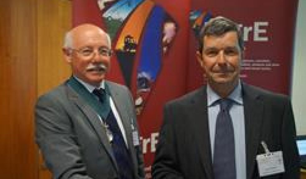 Jeremy, right, receiving his award from Professor Mark Kibblewhite