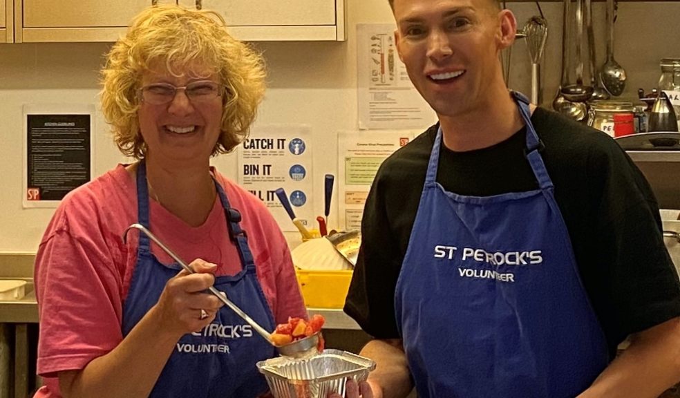 John Burke with Linda, St Petrock’s cook, preparing lunches for rough sleepers. Exeter homelessness charity pilots new business scheme with leading national retailer