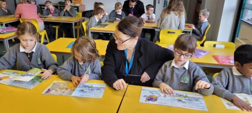 Photo caption: CEO Moira Marder and students