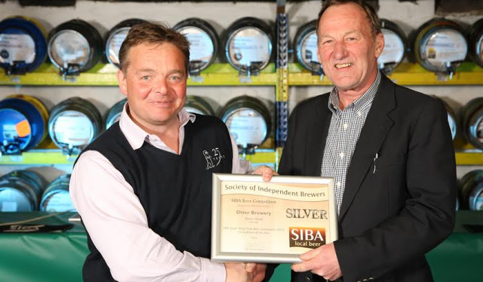 L-R: Patrick McCaig from Otter Brewery with Philip Rush from AVS Wines & Beers at the 2015 Tuckers Maltings Beer Festival.