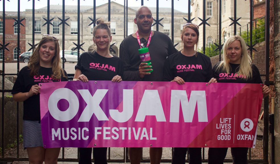 Oxjam volunteer team in front of Exeter Castle. From left: Peggie Clark, Fundraising Coordinator; Mary Peat, Volunteer Coordinator; Steve Byam, Takeover Manager; Danl Tetley, PR and Event Coordinator and Josie Bennett, Marketing Coordinator.