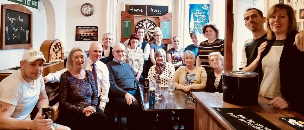 Sefton Hall team in the home's pub with Mike and Eileen Harvey (back and centre)