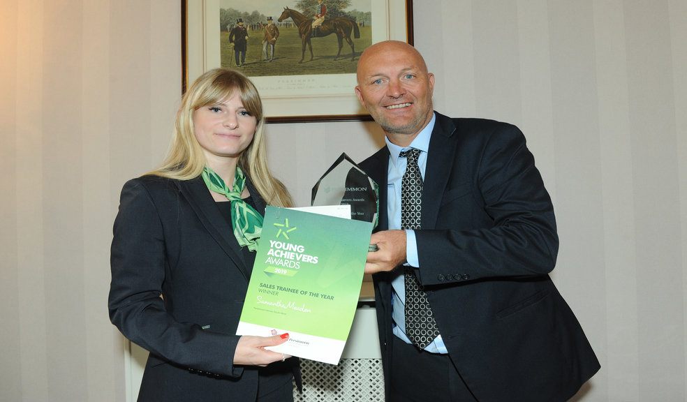 Samantha Meaden receiving her award from Dave Jenkinson, CEO of Persimmon Homes