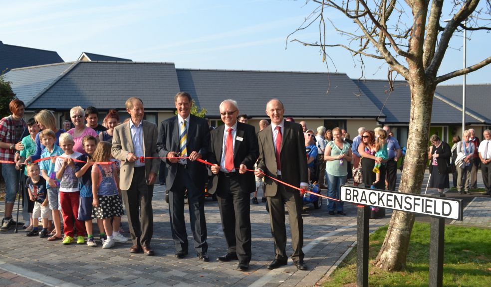 The official ribbon cutting with (L to R) Adam Peat (chairman of Magna Housing Group), Cllr Tim Taylor (leader of West Somerset Council), Graham Colls (group chief executive of Magna) and Tony Murray (Magna West Somerset director)