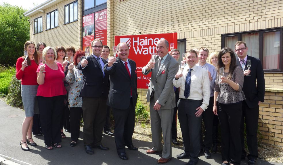 Photograph by Glen King: Front row centre – Haines Watts North Devon LLP Partners, Jonathan Gifford / Vince Edwards / John Edwards and Matthew Melksham celebrate the national accountancy award with Bideford team.