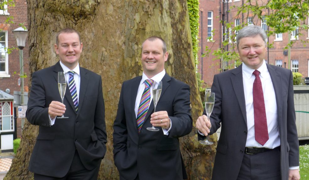 Exeter Partners: Patrick Tigwell, David Park and Ben de Cruz toast the Haines Watts group award success
