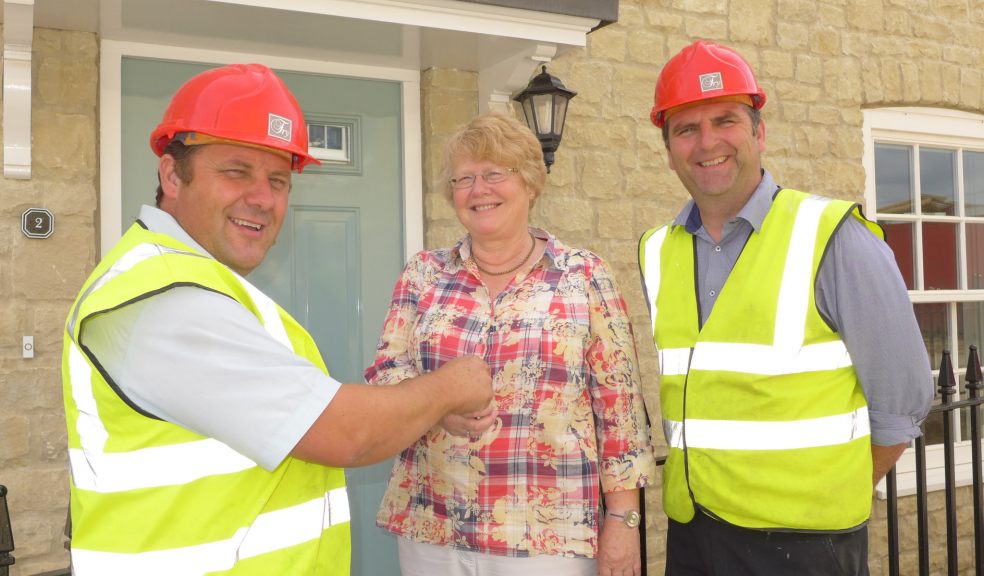 Adrian White - Site manager hands over keys to Jenny Brown with Joe Bond - Finishing Foreman