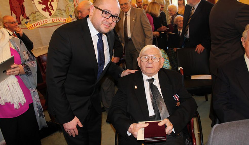 Clifford Ireland from Exeter receives his medal