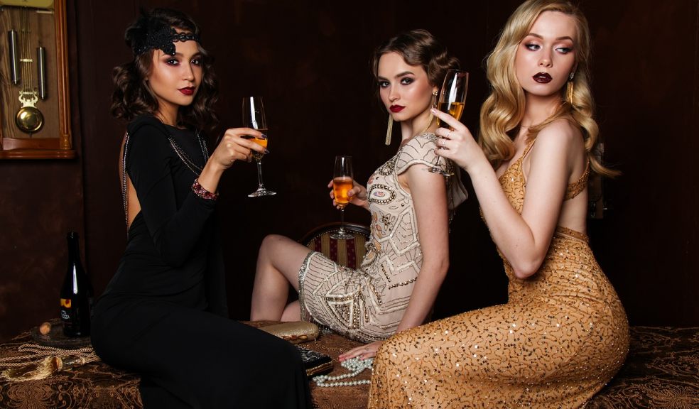 Great Gatsby-themed parties are helping keep vintage clothing shops popular. Great Gatsby-themed parties are helping keep vintage clothing shops popular.