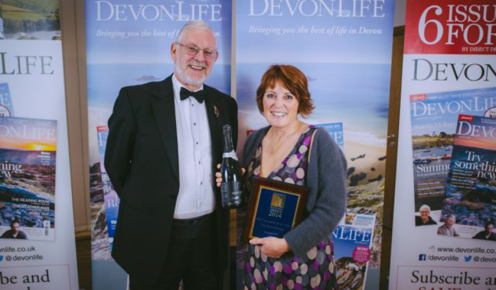 Emma Tay, owner of Two Birds Kitchen, winning the prestigious Best Newcomer award at the Devon Life Food & Drink Awards 2014, presented by David Shephard from the FSB, which sponsors the Best Newcomer category.