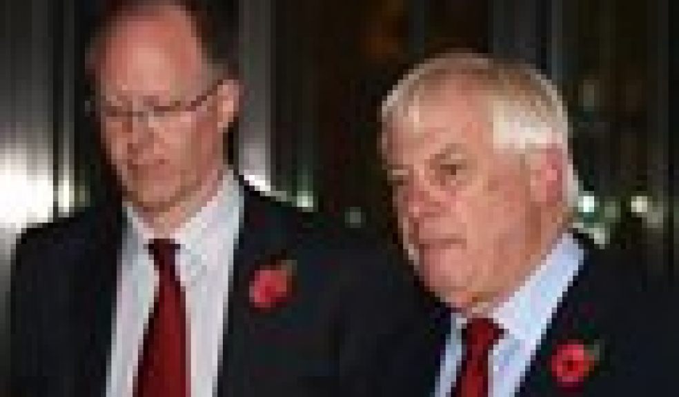 The BBC Director General, George Entwistle, left, stands with the Chairman of the BBC Trust, Lord Chris Patten, as he announces his resignation as Director General outside New Broadcasting House in central London, after recent news program problems, Saturday Nov. 10, 2012. The BBC's director general had said earlier Saturday that it should not have aired a report that wrongly implicated a politician in a child sex-abuse scandal, admitting that the program further damaged trust in a broadcaster already reeling from the fallout over its decision not to air similar allegations against one of its star hosts. George Entwistle's comments followed an embarrassing retreat for the BBC, which apologized Friday for its Nov. 2 "Newsnight" TV show on alleged sex abuse in Wales in the 1970s and 1980s. During the program, victim Steve Messham claimed he had been abused by a senior Conservative Party figure. The BBC didn't name the alleged abuser, but online rumors focused on Alistair McAlpine, a Conservative Party member of