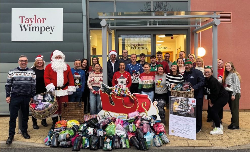 Taylor Wimpey Exeter staff with donated washbags