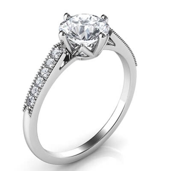 This ring has all the décor as of a high profile but replicated in a low profile engagement ring