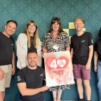 Westbank's Katie Elliott, centre, with the supportive team at Nettl