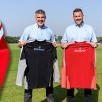 EX2 Group directors with new Exeter City training kit 