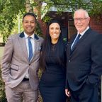 Three family law Directors standing together outside offices