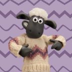 Shaun the sheep wearing a knitted jumper