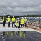 Team members from Summerfield and Devon Contractors on the roof of Westpark 26 Business Park in Well