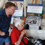 Eddie with Luke Portnow looking at the exhibition.