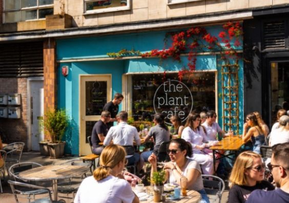independent cafes business with customers sitting outside in the sunshine