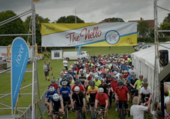 Riders line up for the start of the Nello