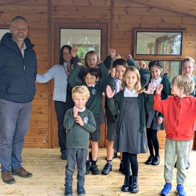 Dan Western and Jacqui Taylor with Ottery Primary School pupils