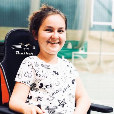 Amelia Kwiecinska in the wheelchair that she currently borrows to play wheelchair football