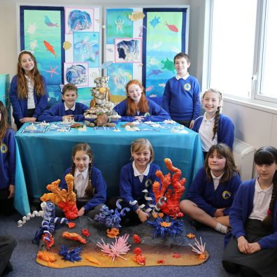 Members of the Broadclyst Art Squad with their shortlisted entry