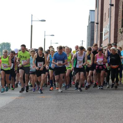 Marathon runners get ready to race at Exeter Quayside