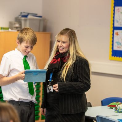 Student and teacher using Sparx on tablet computer