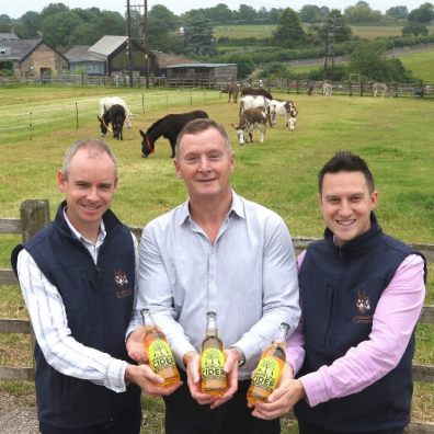 Pictured with Lyme Bay Winery’s Bob Harding (centre) is Ben Winnard – Retail and Catering Operations Manager (left) and James Searle – Head of Commercial Activities (both from The Donkey Sanctuary).