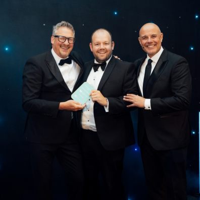 Will Jordan (centre) receives MAT Excellence Award for IMP Software.