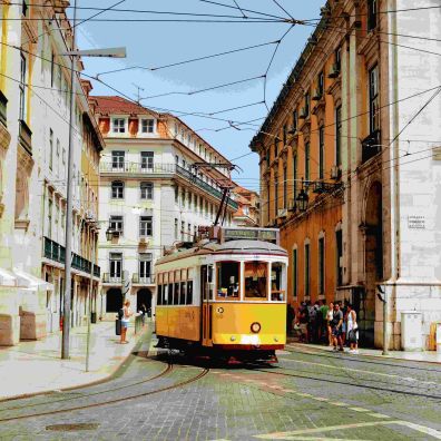 Iconic yellow tram going through Lisbon