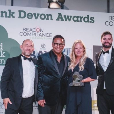 Photo caption: Greg Parsons, chair of Food Drink Devon with the 2025 People's Choice Award ‘Hospitality Venue of the Year’ The Cottage Hotel and Andrew Ward, Empire Services