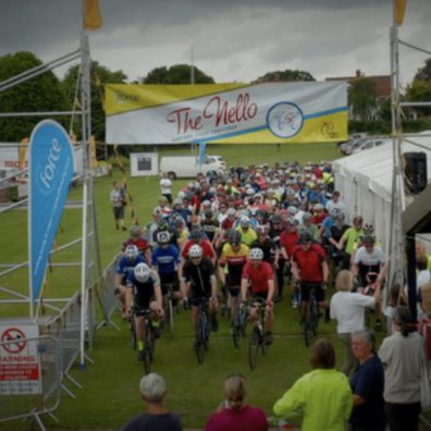 Riders line up for the start of the Nello