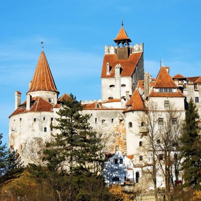 Castle in Romania in front of blue sky